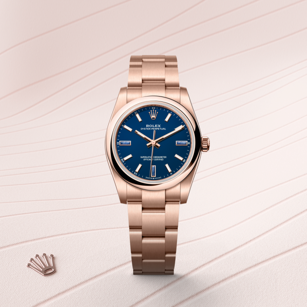 Rolex Oyster Perpetual in 18 ct Everose gold, M124205-0002 - H.L. Gross Jewelers