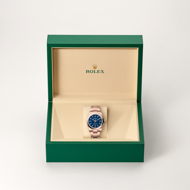 Rolex Oyster Perpetual in 18 ct Everose gold, M124205-0002 - H.L. Gross Jewelers
