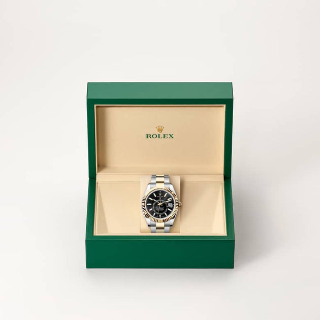 Rolex Sky-Dweller in Yellow Rolesor - combination of Oystersteel and yellow gold, M336933-0003 - H.L. Gross Jewelers
